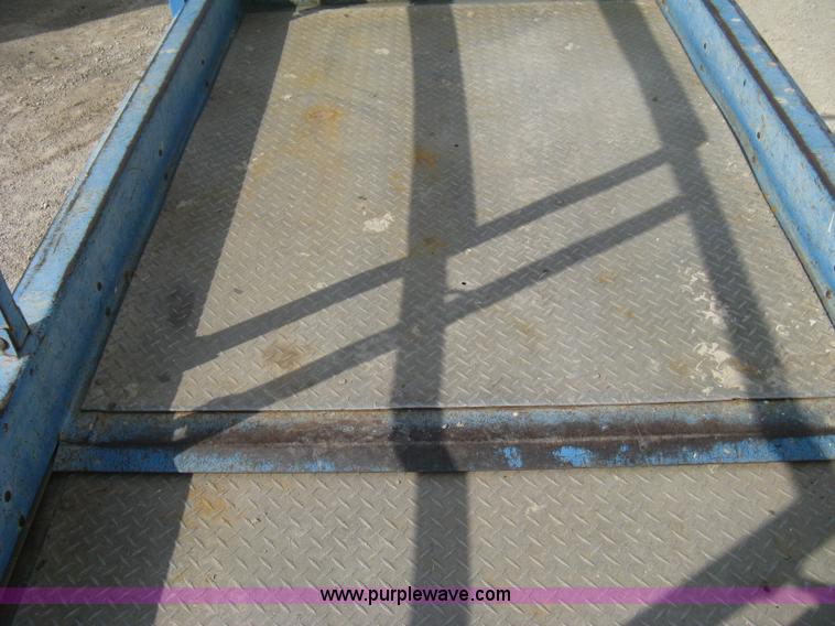 image for item B8299 2003 Genie GS-3268RT rough terrain scissor lift