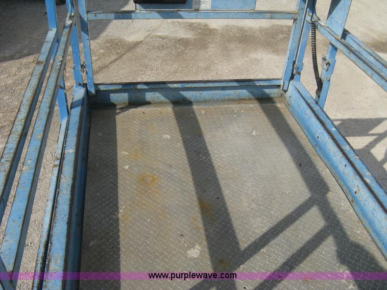 image for item B8299 2003 Genie GS-3268RT rough terrain scissor lift