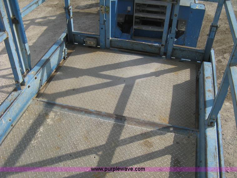 image for item B8299 2003 Genie GS-3268RT rough terrain scissor lift