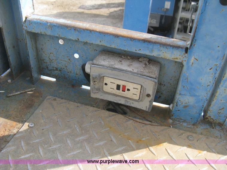 image for item B8299 2003 Genie GS-3268RT rough terrain scissor lift