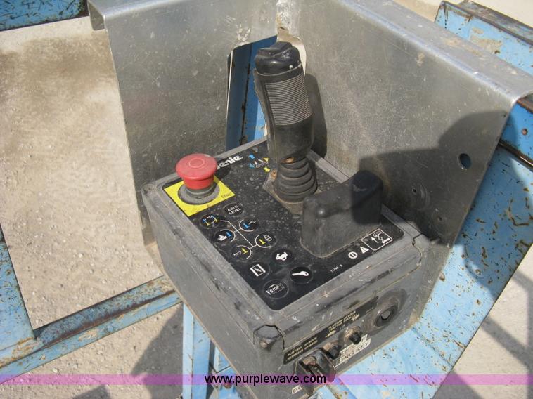 image for item B8299 2003 Genie GS-3268RT rough terrain scissor lift