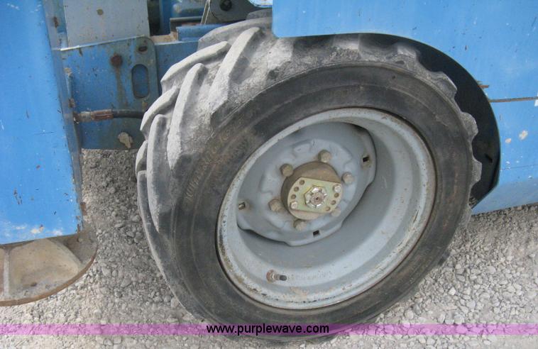 image for item B8299 2003 Genie GS-3268RT rough terrain scissor lift