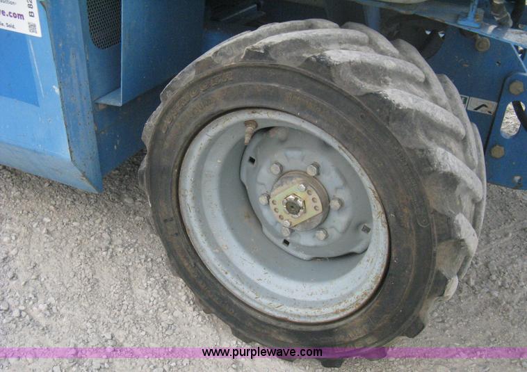 image for item B8299 2003 Genie GS-3268RT rough terrain scissor lift