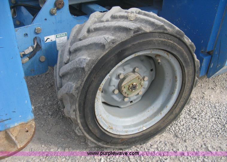 image for item B8299 2003 Genie GS-3268RT rough terrain scissor lift