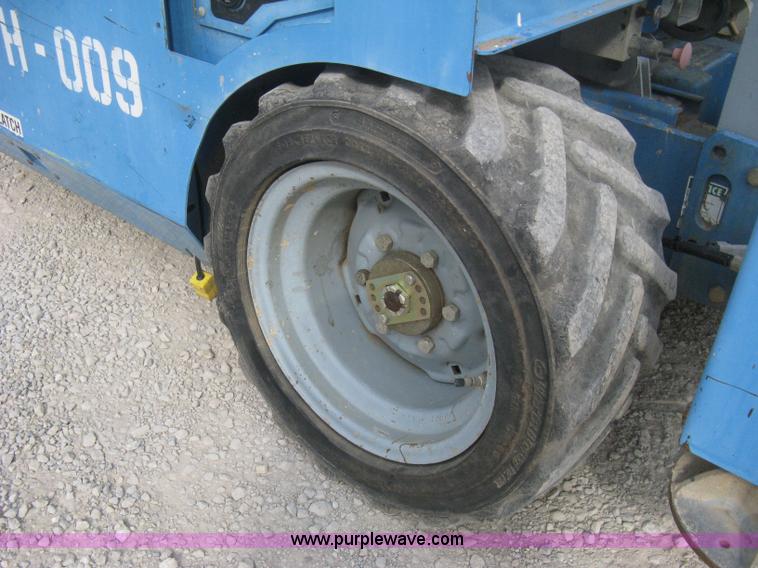 image for item B8299 2003 Genie GS-3268RT rough terrain scissor lift