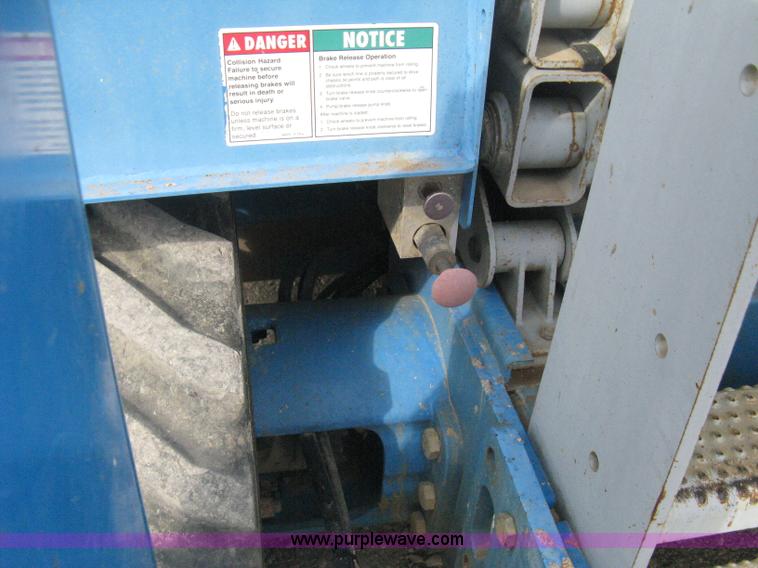 image for item B8299 2003 Genie GS-3268RT rough terrain scissor lift