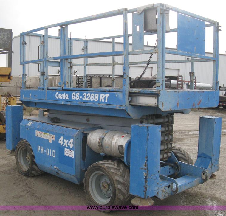 image for item B8300 2003 Genie GS-3268RT rough terrain scissor lift