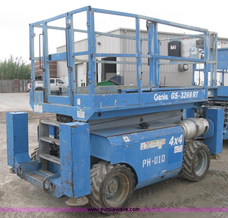 image for item B8300 2003 Genie GS-3268RT rough terrain scissor lift