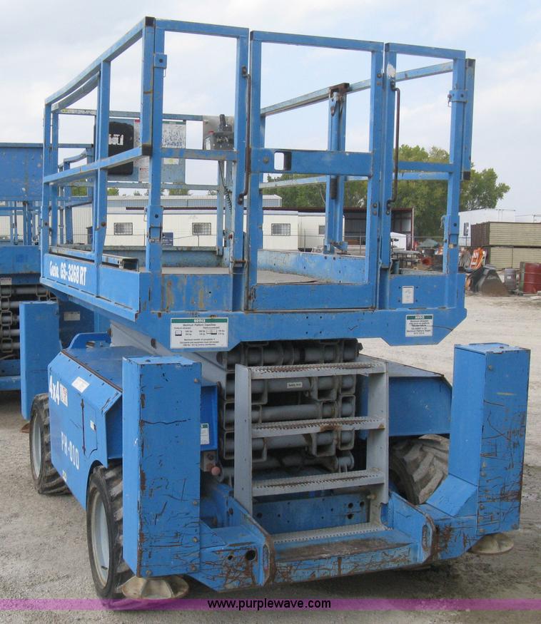 image for item B8300 2003 Genie GS-3268RT rough terrain scissor lift