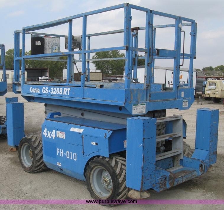 image for item B8300 2003 Genie GS-3268RT rough terrain scissor lift