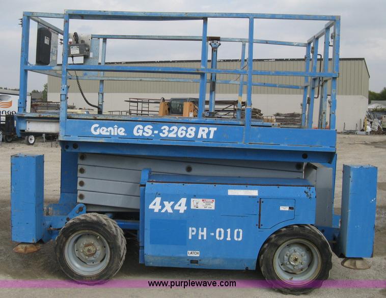 image for item B8300 2003 Genie GS-3268RT rough terrain scissor lift