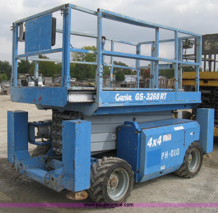 image for item B8300 2003 Genie GS-3268RT rough terrain scissor lift