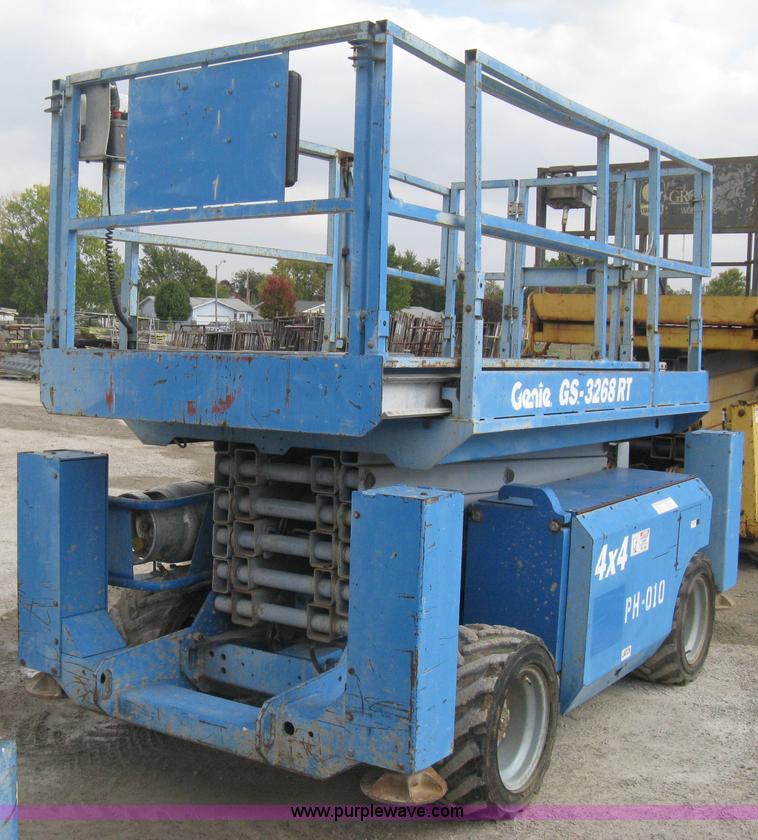 image for item B8300 2003 Genie GS-3268RT rough terrain scissor lift