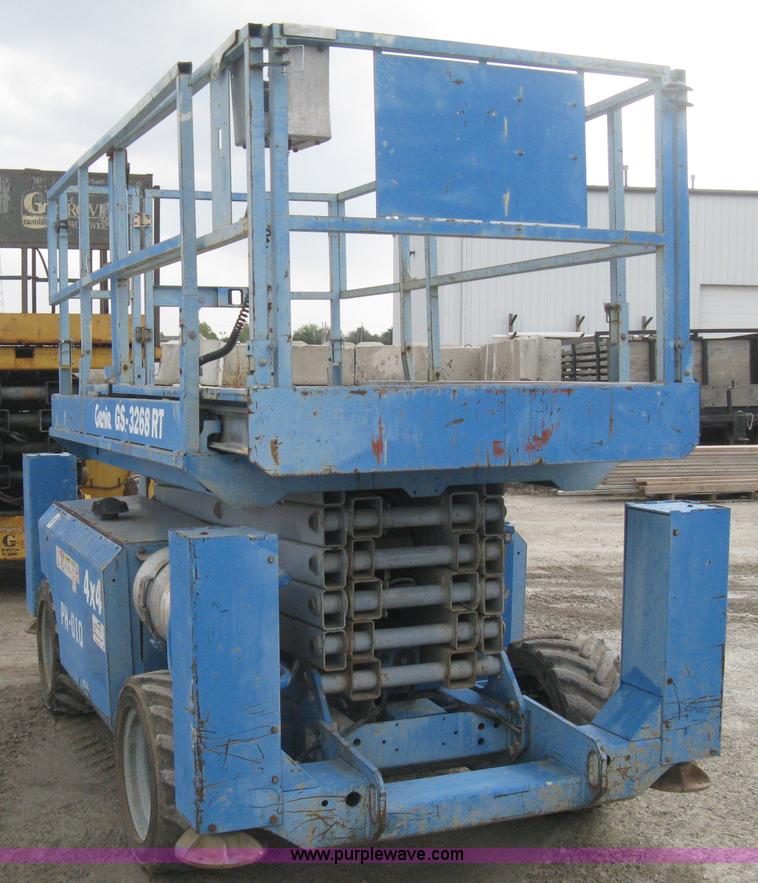 image for item B8300 2003 Genie GS-3268RT rough terrain scissor lift