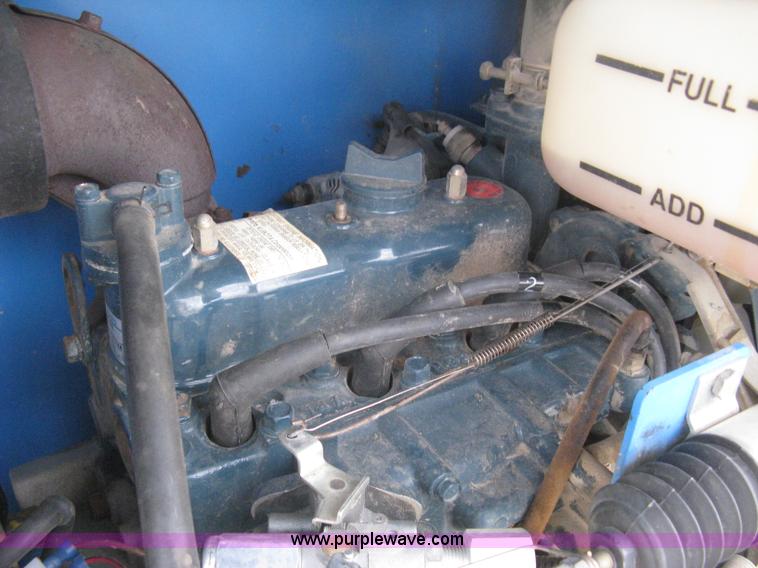 image for item B8300 2003 Genie GS-3268RT rough terrain scissor lift