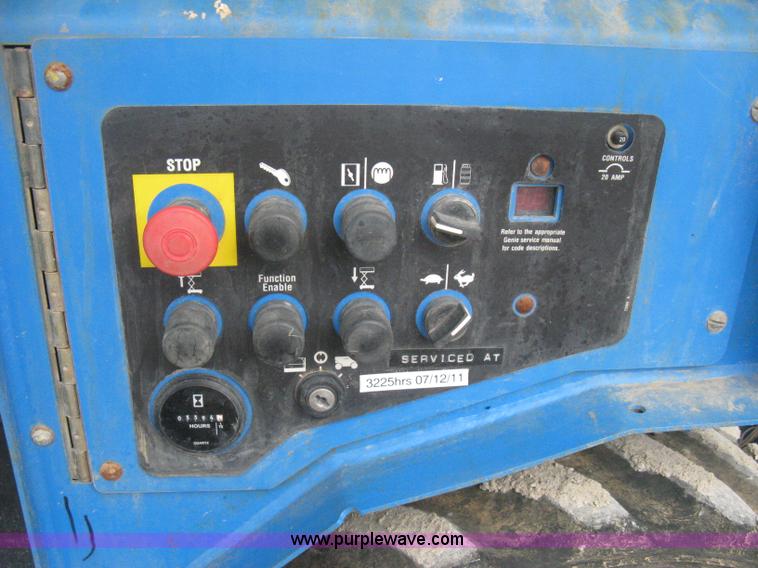 image for item B8300 2003 Genie GS-3268RT rough terrain scissor lift