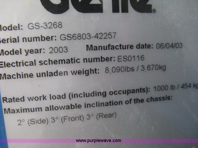 image for item B8300 2003 Genie GS-3268RT rough terrain scissor lift