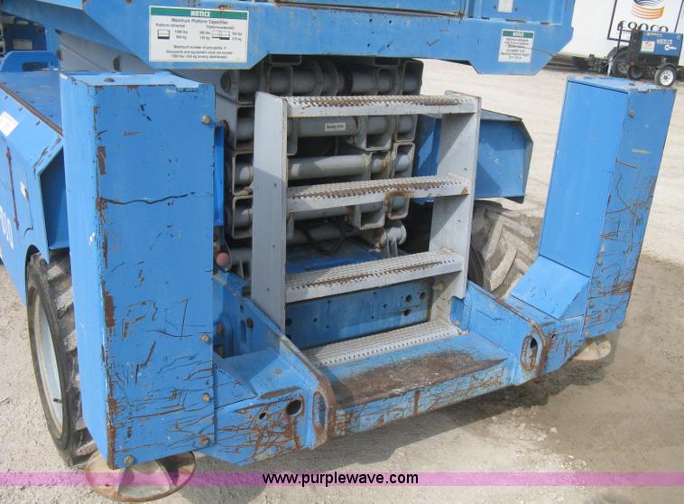 image for item B8300 2003 Genie GS-3268RT rough terrain scissor lift