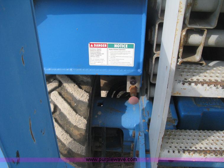 image for item B8300 2003 Genie GS-3268RT rough terrain scissor lift