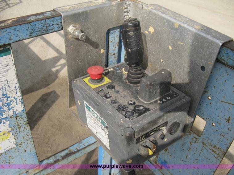 image for item B8300 2003 Genie GS-3268RT rough terrain scissor lift