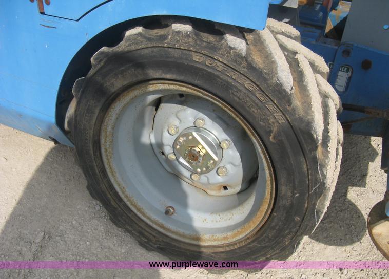 image for item B8300 2003 Genie GS-3268RT rough terrain scissor lift