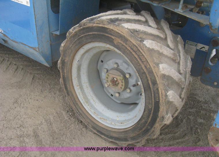 image for item B8300 2003 Genie GS-3268RT rough terrain scissor lift