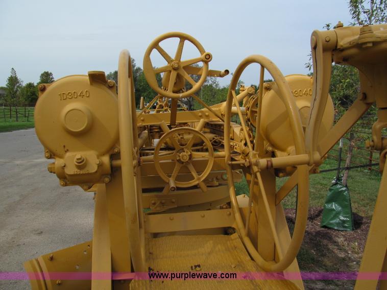 image for item E5551 Caterpillar pull type grader