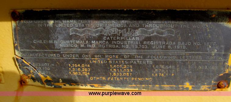 image for item E5551 Caterpillar pull type grader