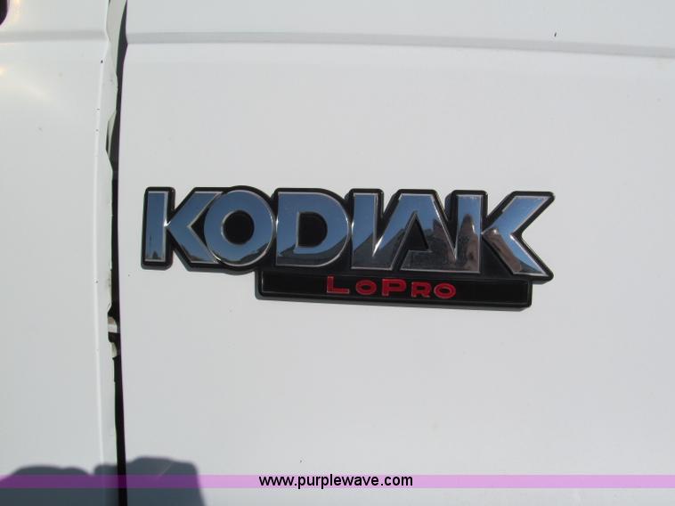 image for item E5609 1996 Chevrolet Kodiak flatbed tow truck