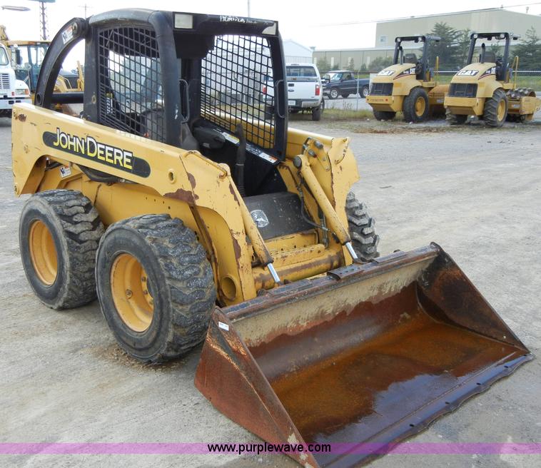image for item F7503 2002 John Deere 250 skid steer