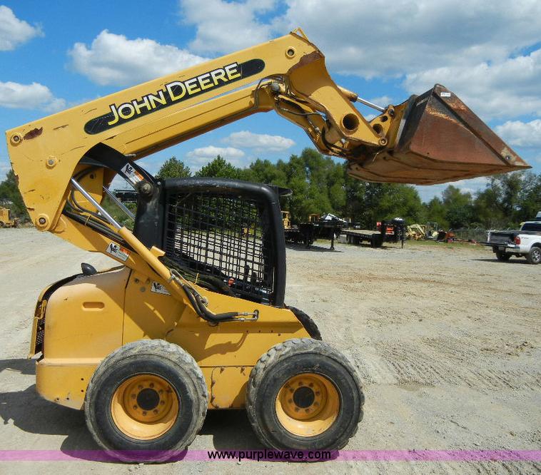 image for item F7503 2002 John Deere 250 skid steer