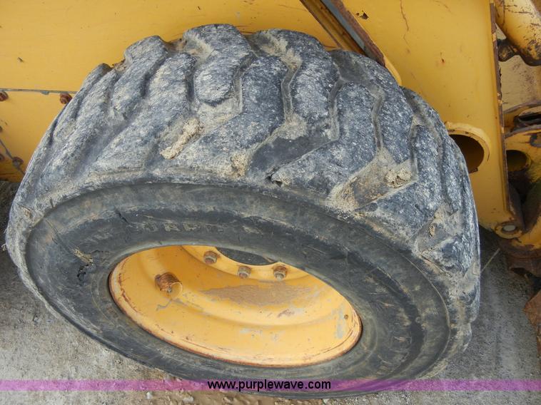 image for item F7503 2002 John Deere 250 skid steer