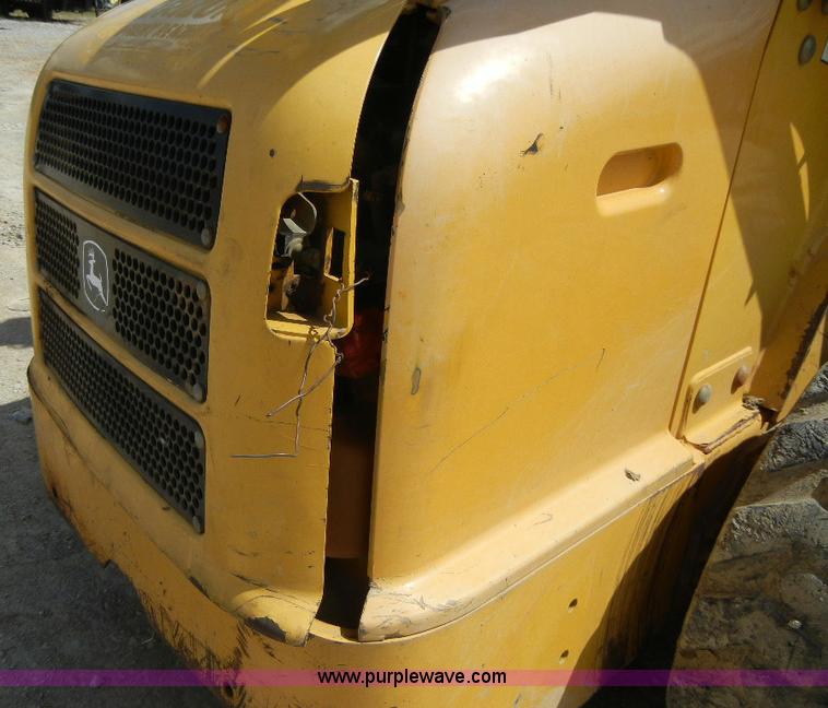 image for item F7503 2002 John Deere 250 skid steer