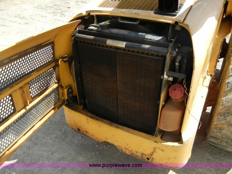 image for item F7503 2002 John Deere 250 skid steer