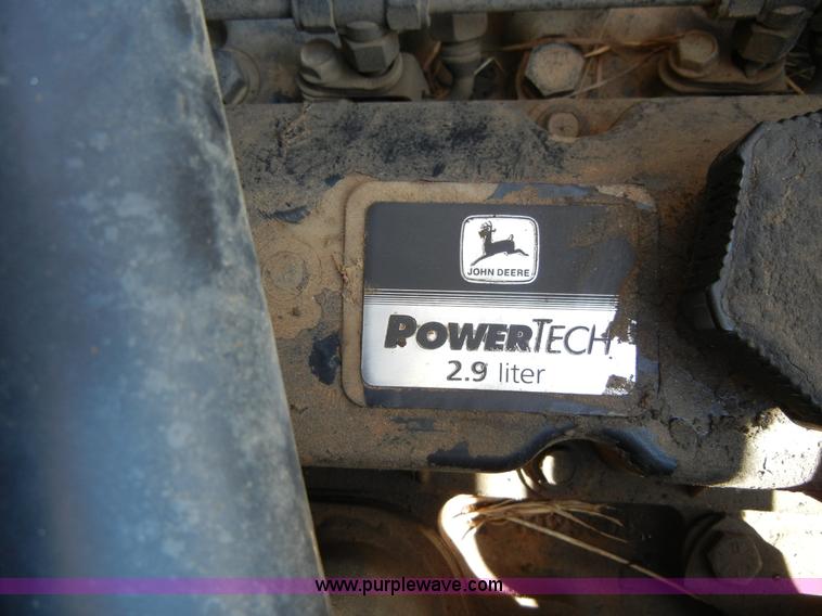 image for item F7503 2002 John Deere 250 skid steer