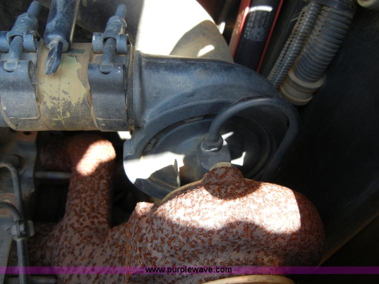 image for item F7503 2002 John Deere 250 skid steer