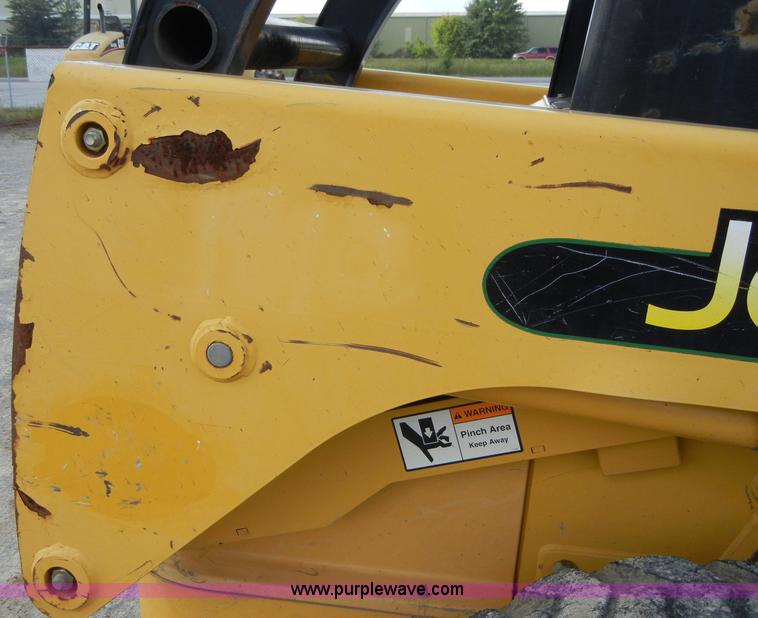 image for item F7503 2002 John Deere 250 skid steer