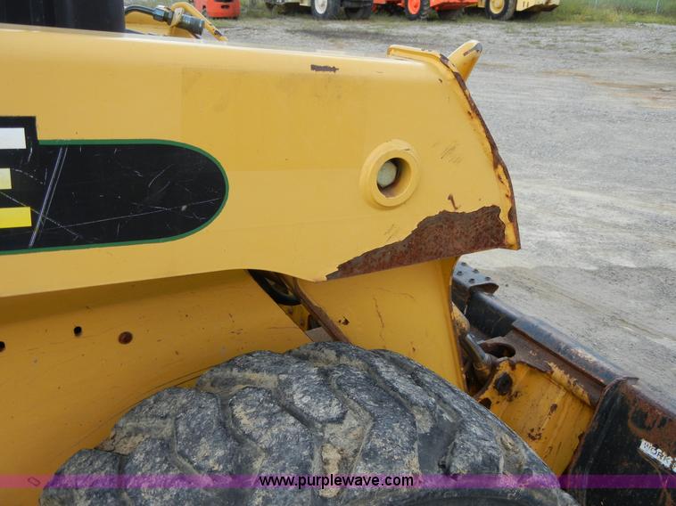image for item F7503 2002 John Deere 250 skid steer