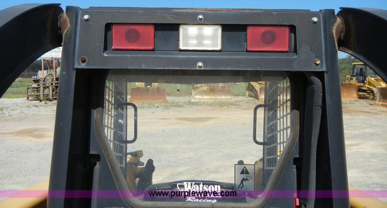 image for item F7503 2002 John Deere 250 skid steer