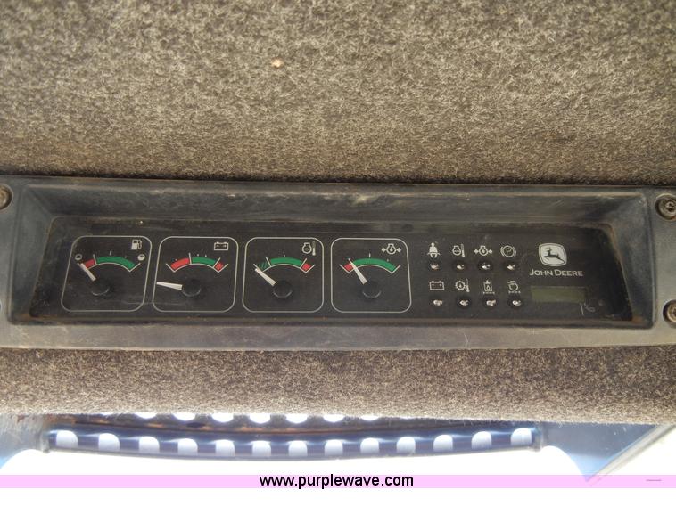 image for item F7503 2002 John Deere 250 skid steer