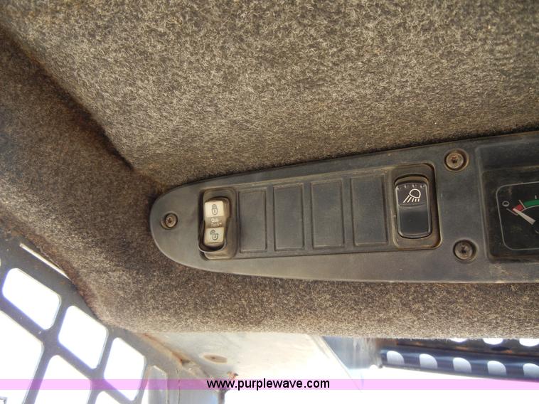 image for item F7503 2002 John Deere 250 skid steer