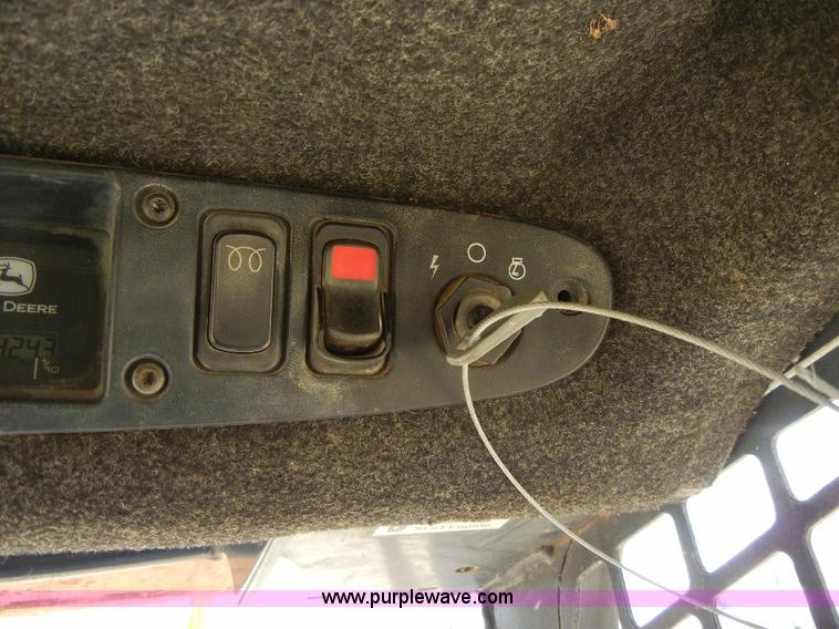 image for item F7503 2002 John Deere 250 skid steer