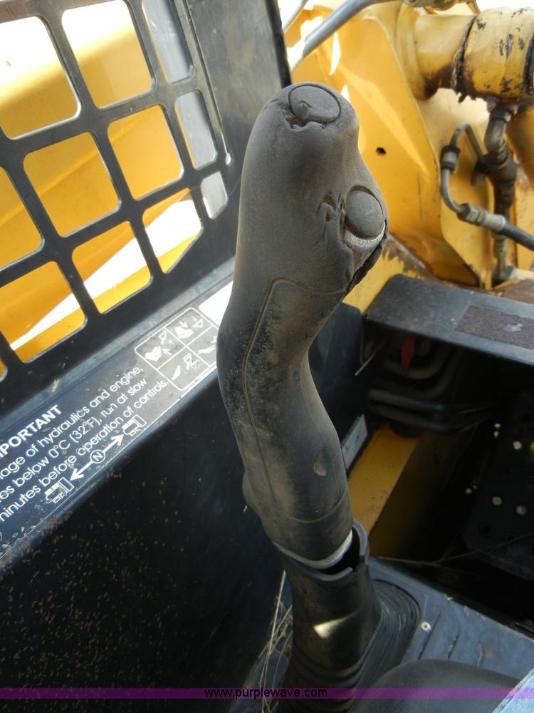 image for item F7503 2002 John Deere 250 skid steer