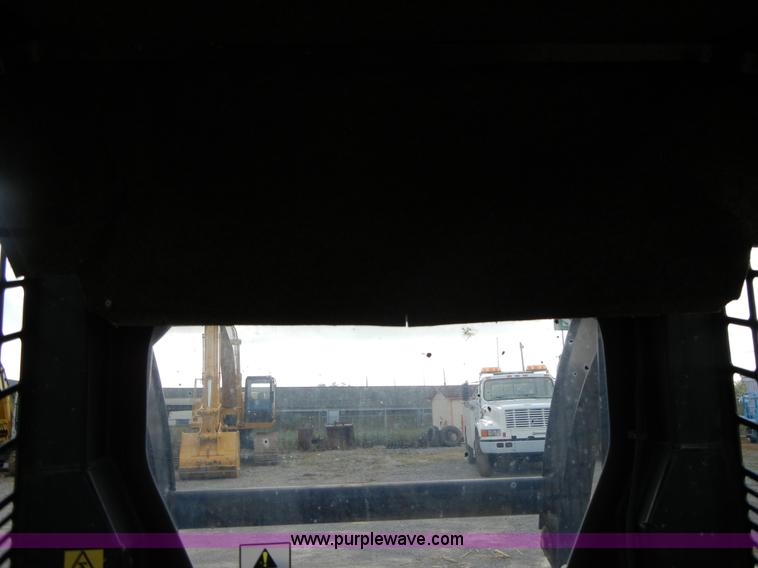 image for item F7503 2002 John Deere 250 skid steer