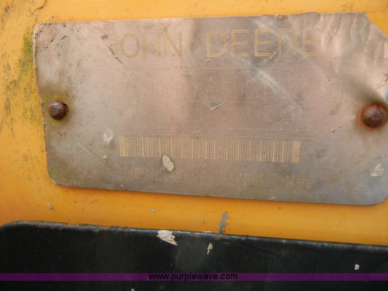 image for item F7503 2002 John Deere 250 skid steer