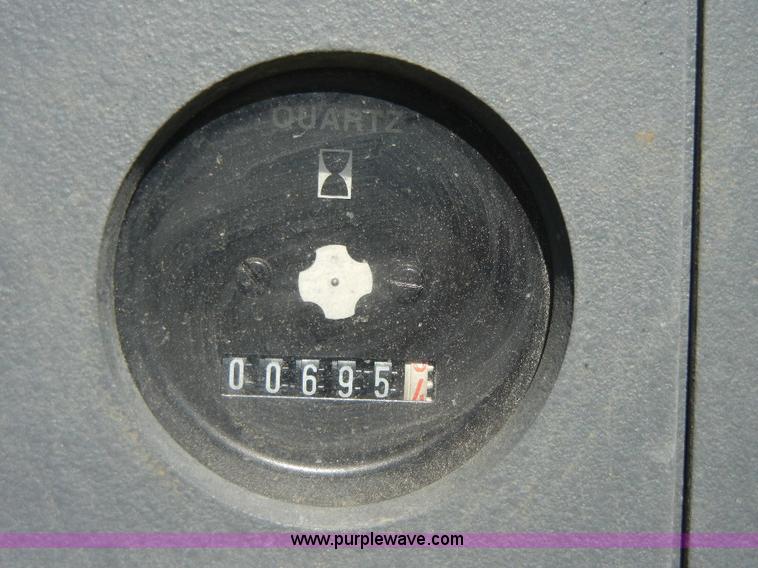 image for item F7507 2000 Ingersoll Rand 185 portable air compressor