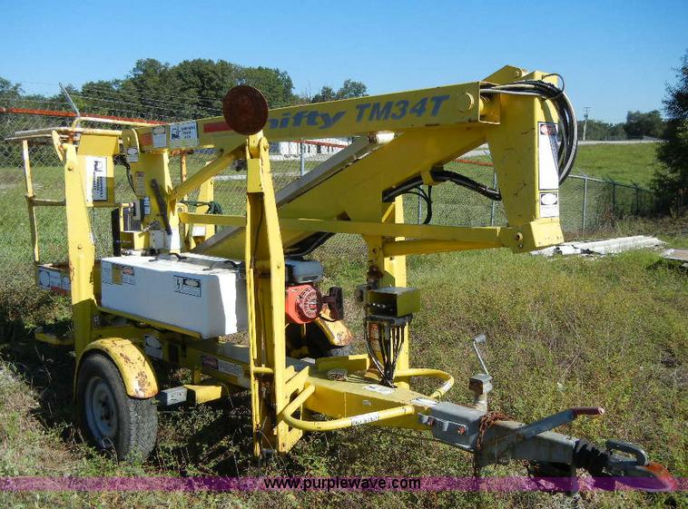 image for item F7509 2000 Nifty-Lift 120TGE towable boom lift