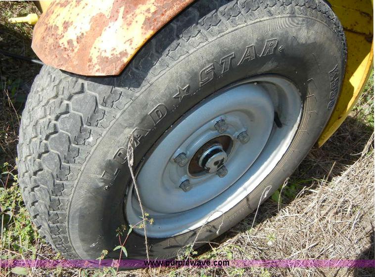 image for item F7509 2000 Nifty-Lift 120TGE towable boom lift