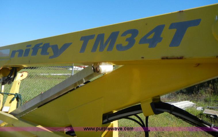 image for item F7509 2000 Nifty-Lift 120TGE towable boom lift