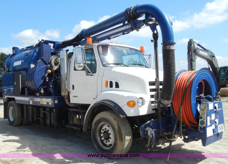 image for item F7518 2003 Sterling L7500 semi truck with Vac-Con system
